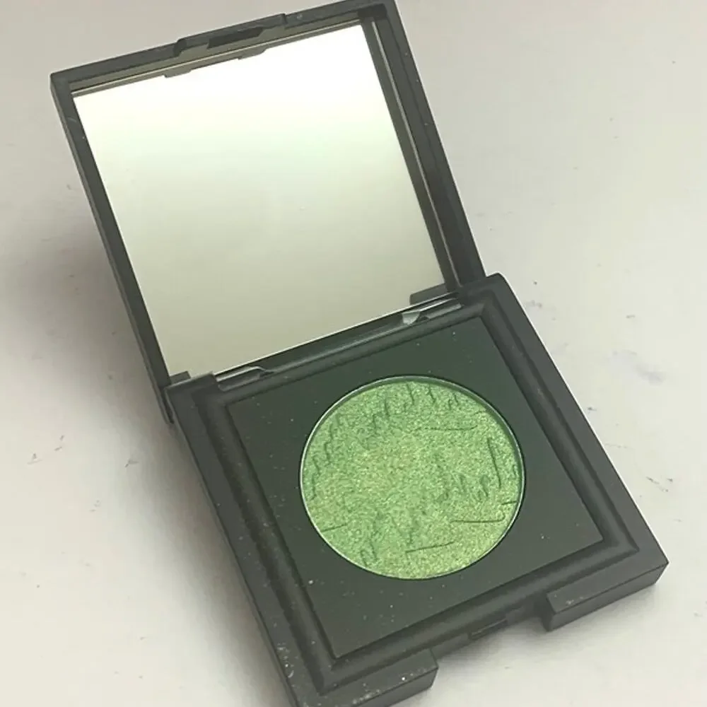 NOMAD Cosmetics Intense Eyeshadow Single in a metallic lime/green shimmer shade